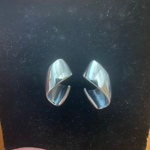 Silver retired twist earrings